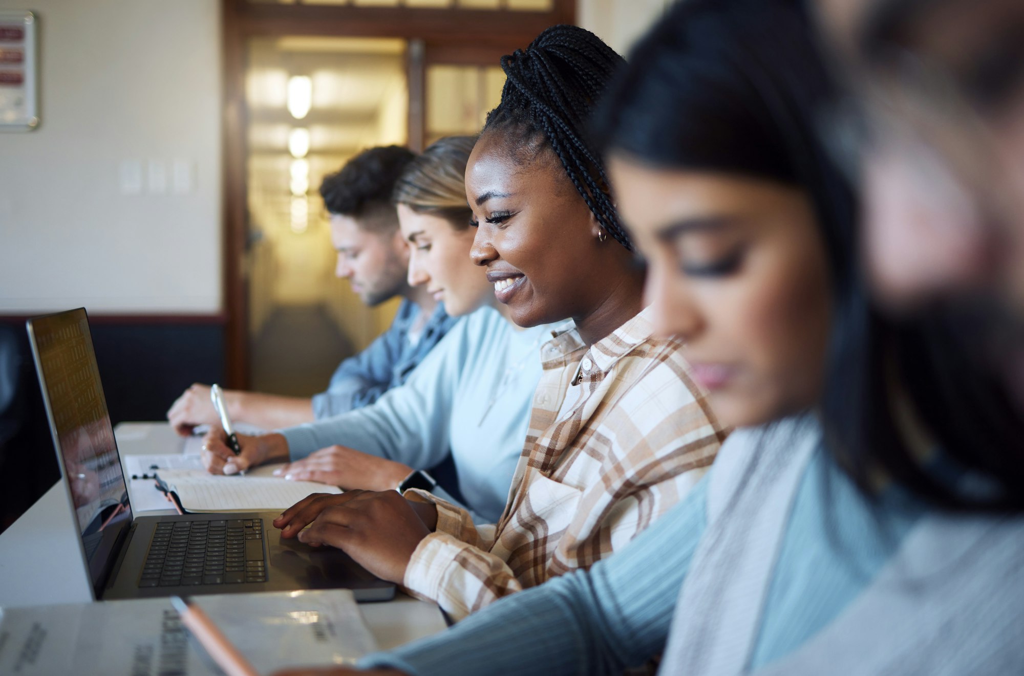 black-woman-education-and-student-with-university-study-with-laptop-and-research-for-project-in-c